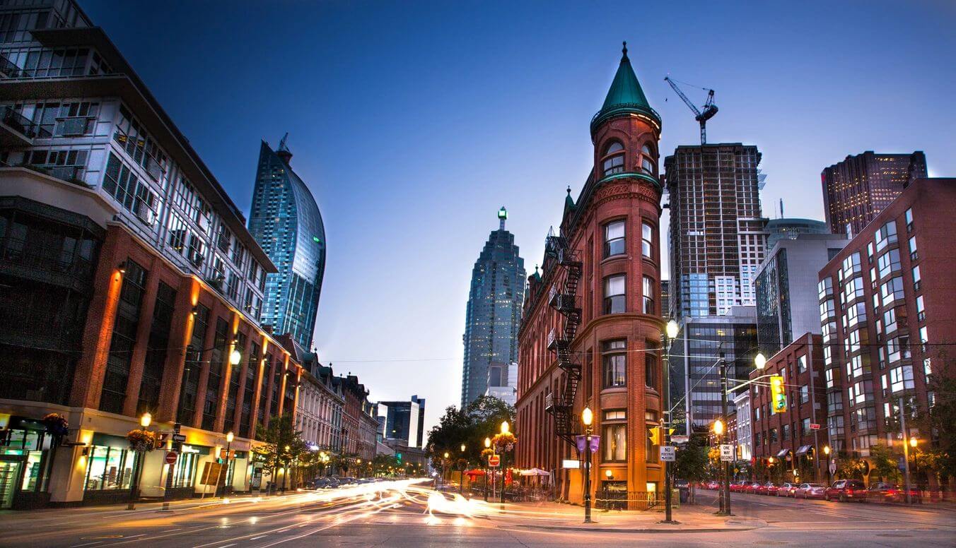 Cityscape with historic building and skyscrapers.